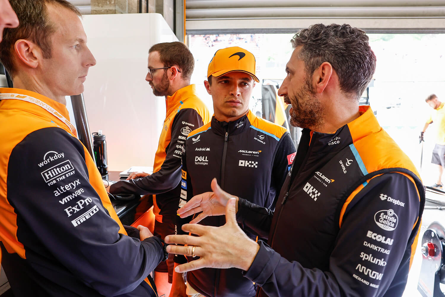 Lando Norris talking to his McLaren engineers