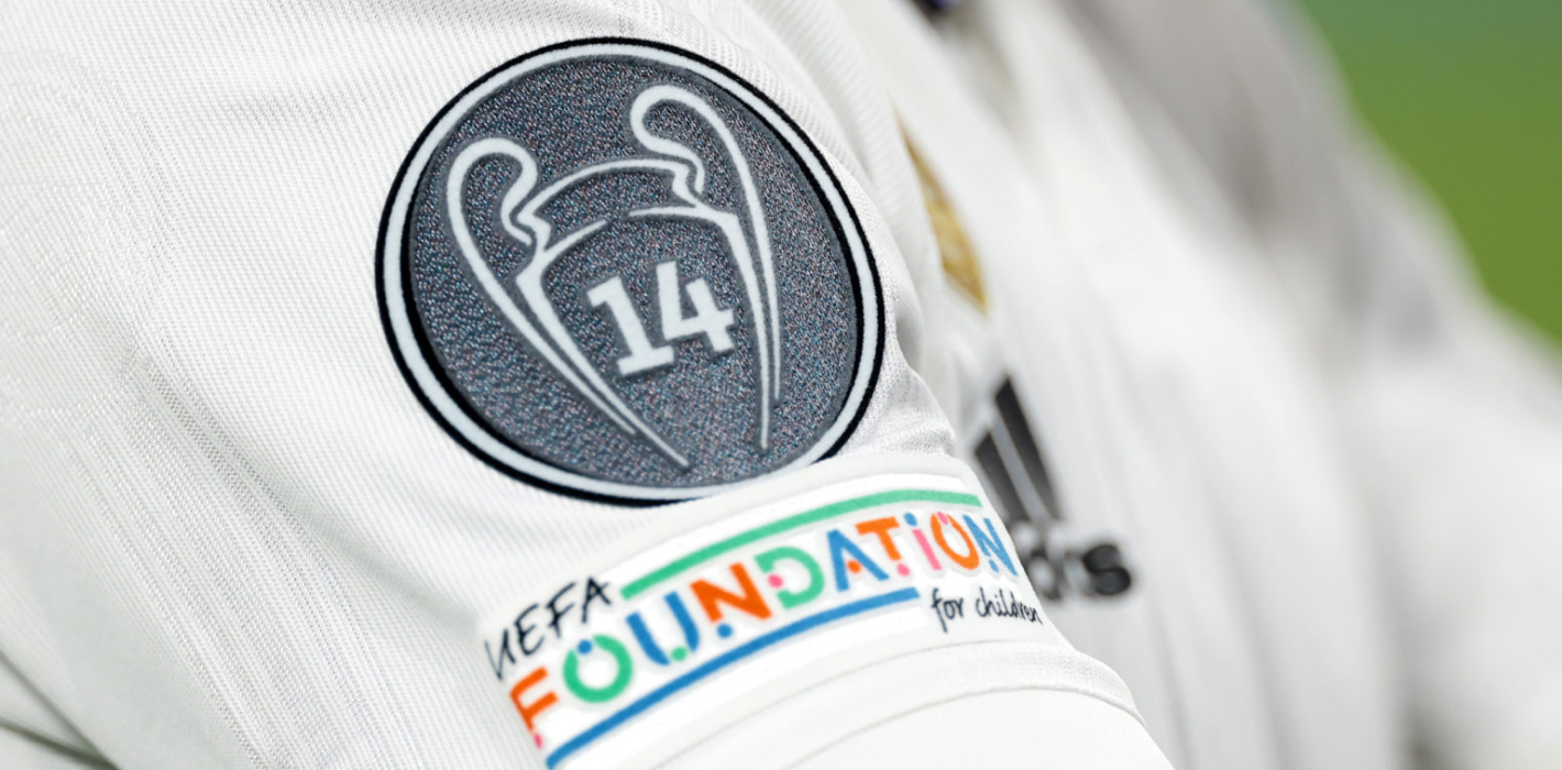 Real Madrid shirt with the 14 times Champions League winner arm badge
