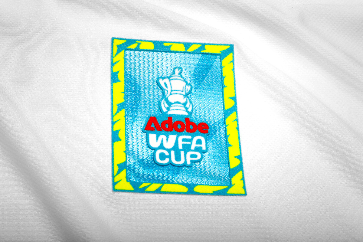 Image showing the detail in a Adobe WFA Cup badge