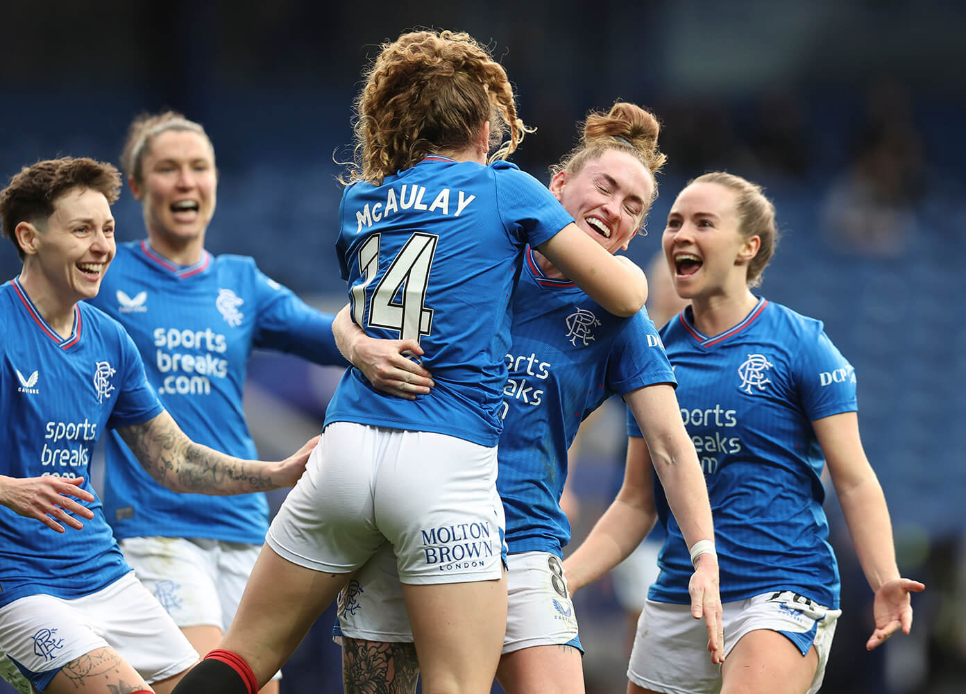 Image showing a number of Rangers Women's players celebrating while wearing the official SWPL font