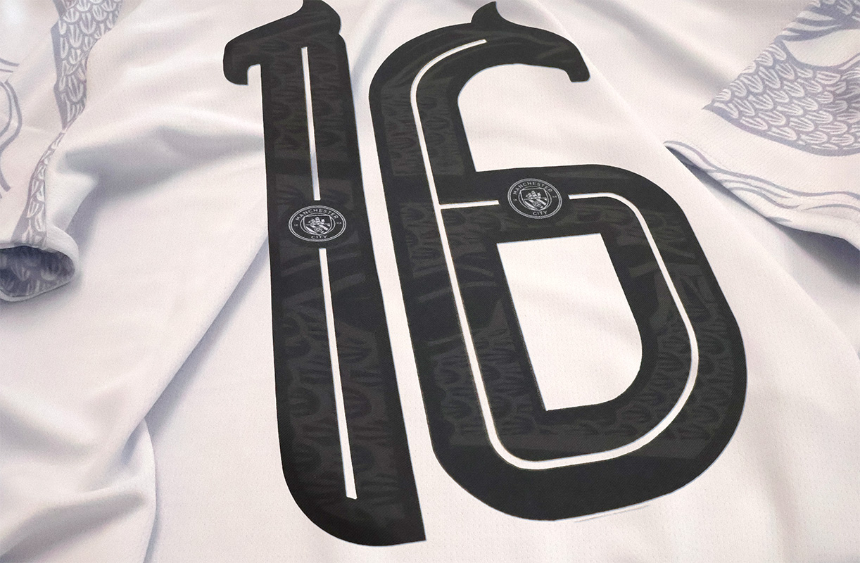 Image showing detailed Ultratex textured transfers on a Man City jersey